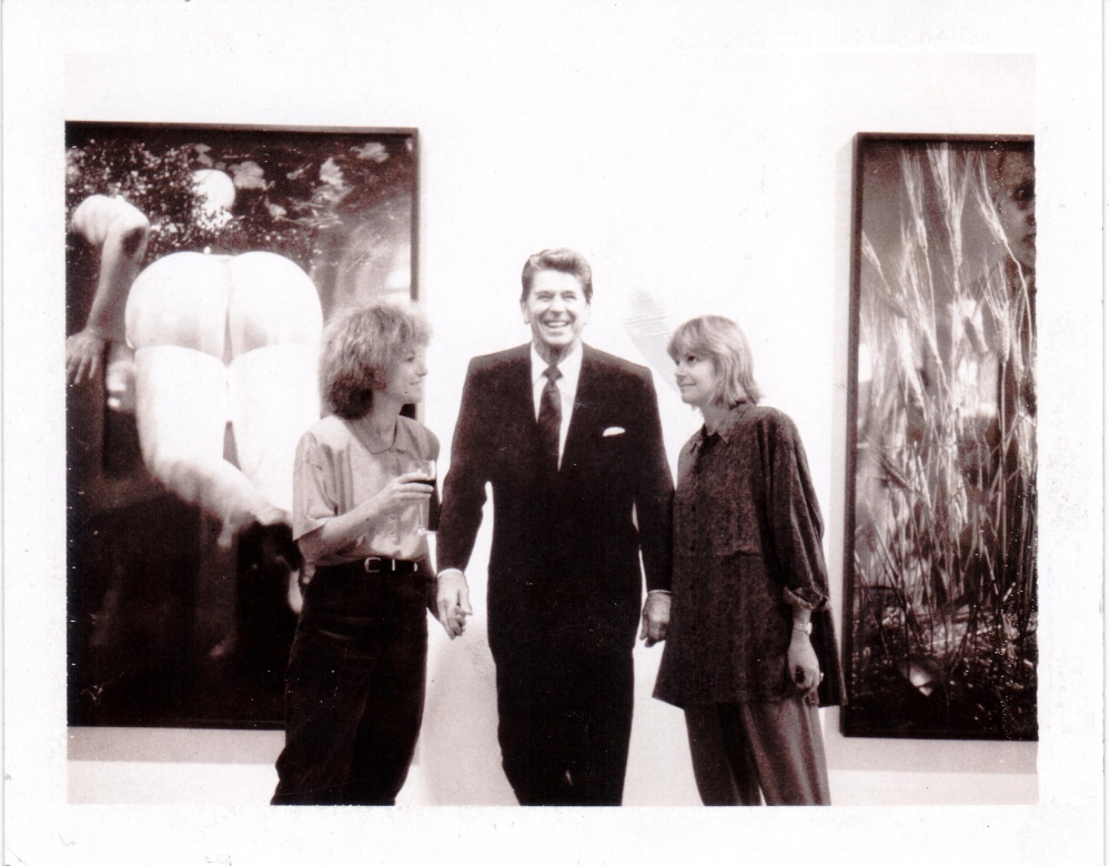 Helene Winer and Janelle Reiring in front of Cindy Sherman works