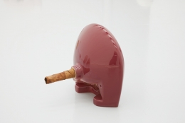 Plug, 2018. Ceramic sink, hand-rolled cigar, 16 x 17 x 13 1/2 inches (40.6 x 43.2 x 34.3 cm).
