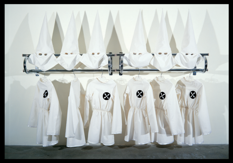 Gary Simmons installation of 6 KKK costumes on a rack